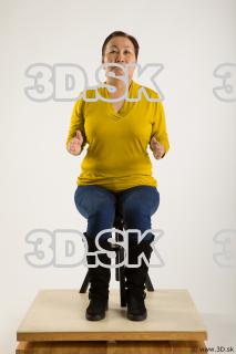 Sitting reference of yellow sweater blue jeans Gwendolyn 0015